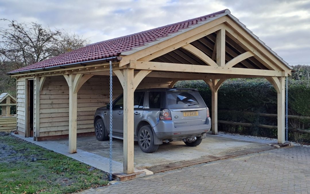 Triple oak frame carport with workshop near devizes
