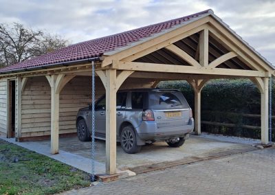 Triple oak frame carport with workshop near devizes